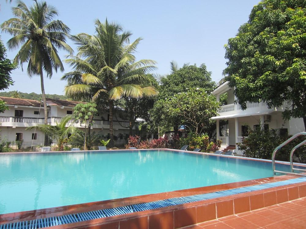 Hotel Riverside Baga Exterior photo