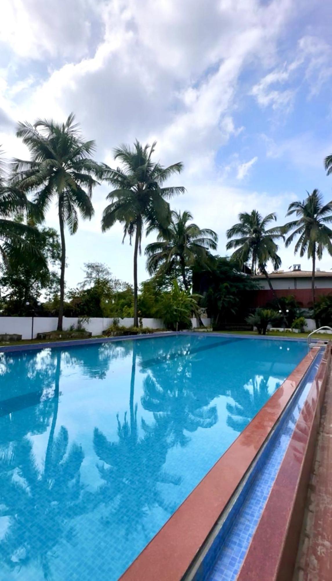 Hotel Riverside Baga Exterior photo