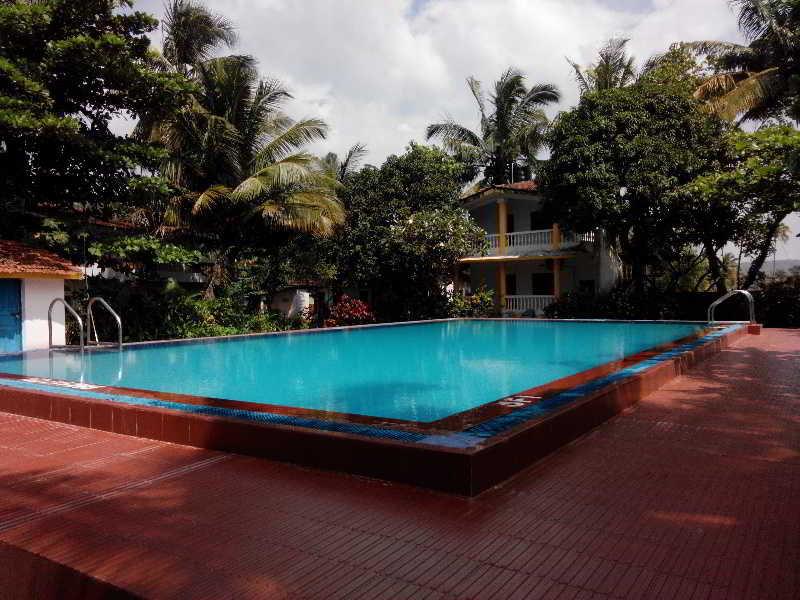 Hotel Riverside Baga Exterior photo